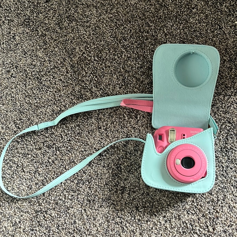 Instax mini 9 Polaroid and light blue instax Polaroid case